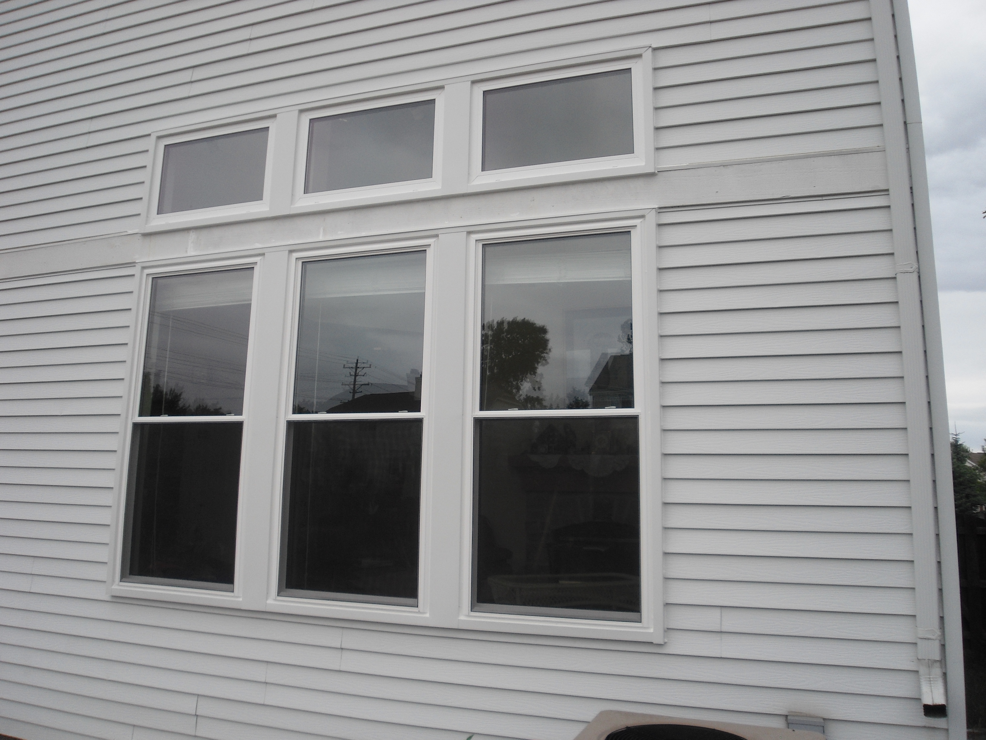 We install frames, insulate around the window and finish them on the exterior with maintenance free aluminum in any color. The end result is a warm, draft free window.